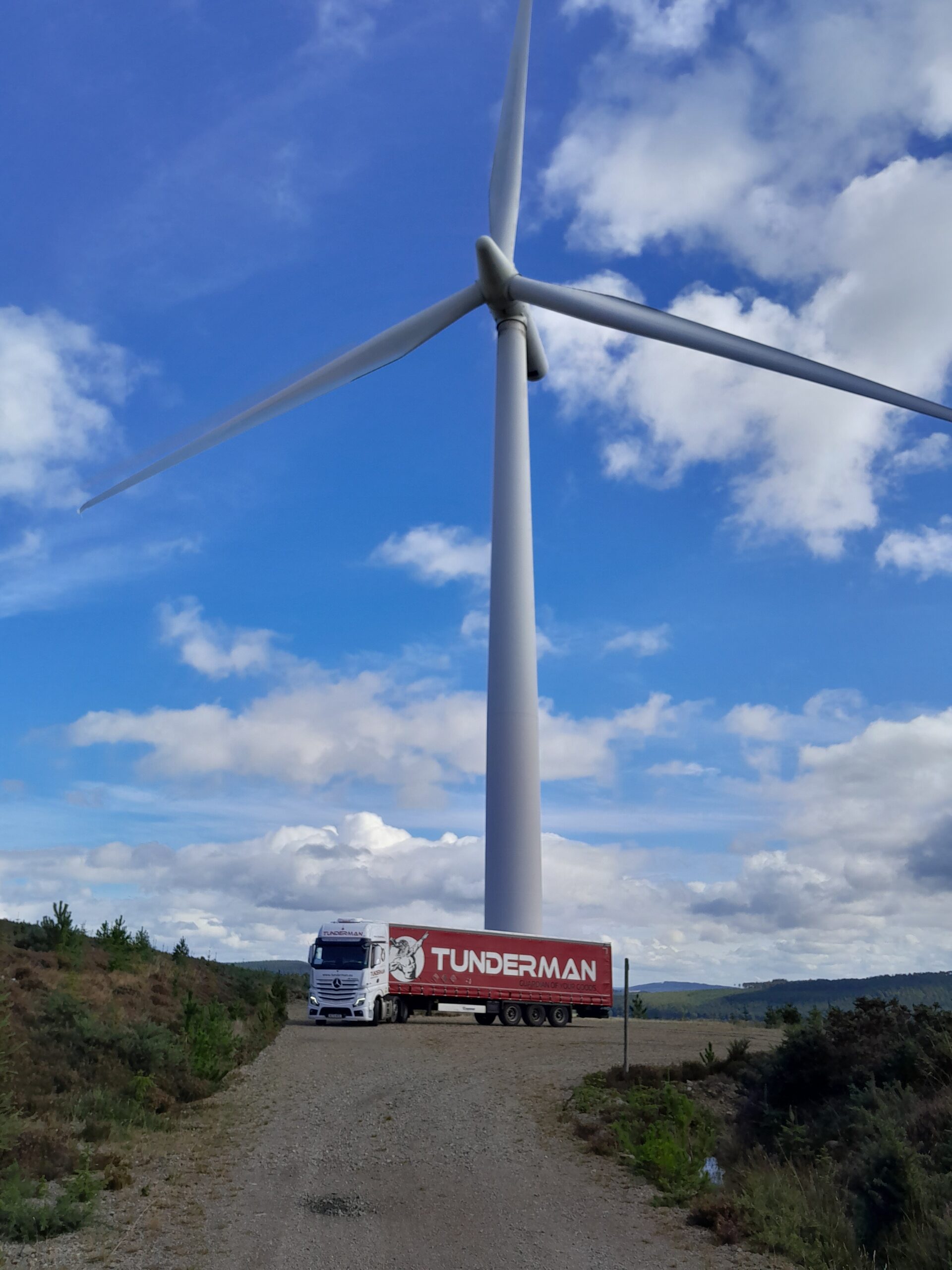 Tunderman Truck in front of a windmill